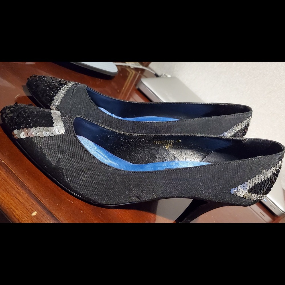 Black Fabric and black & silver sequence Notorious for Chandlers 7.5 M